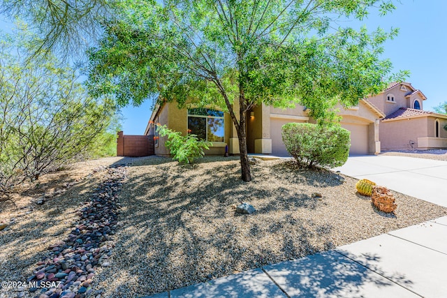 view of front of property with a garage