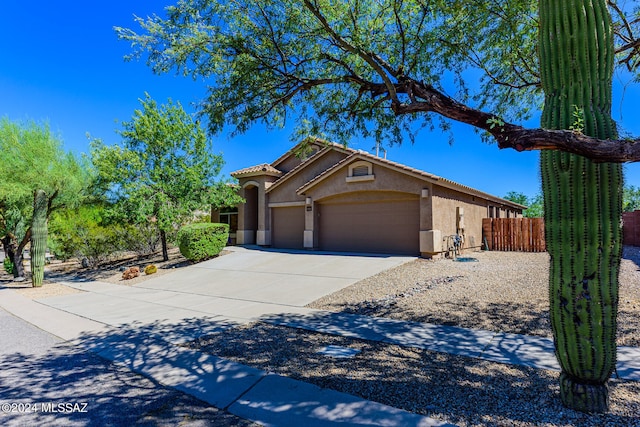 view of front of home with a garage