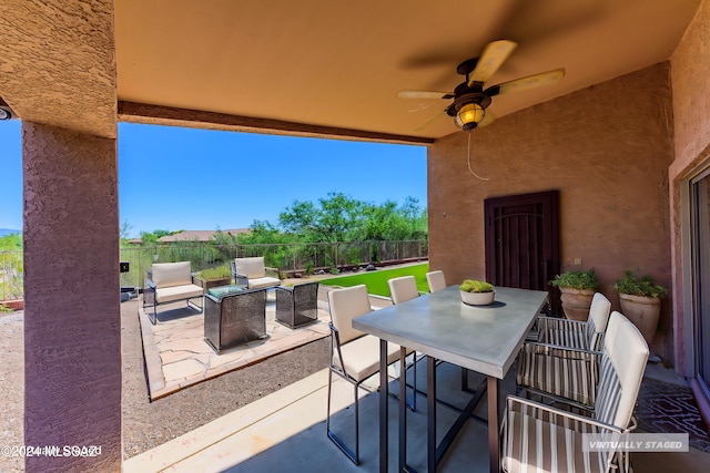 view of patio / terrace featuring outdoor lounge area and ceiling fan