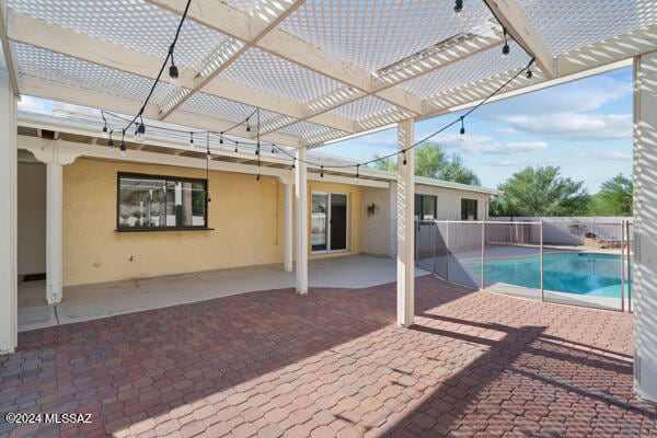 view of pool featuring a pergola and a patio area