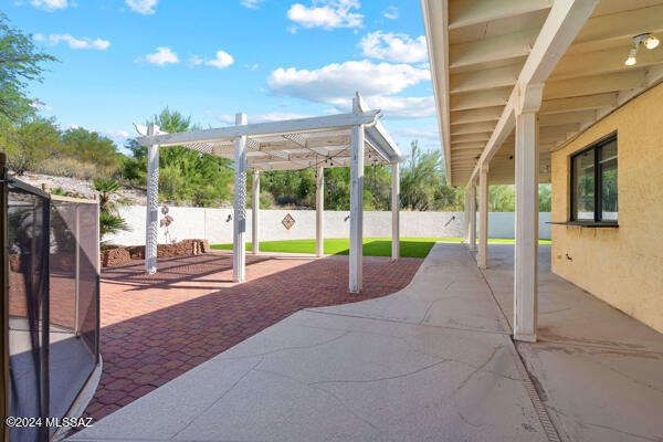 view of patio featuring a pergola