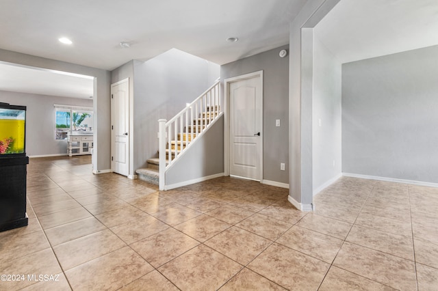 interior space featuring light tile patterned floors