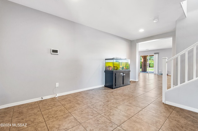 interior space with light tile patterned floors