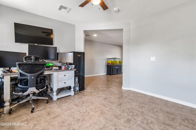 tiled office space with ceiling fan