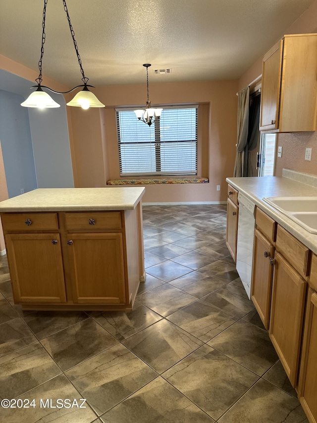 kitchen with sink, a center island, hanging light fixtures, a textured ceiling, and dishwasher