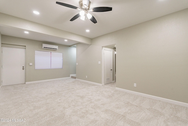 carpeted empty room with ceiling fan and an AC wall unit