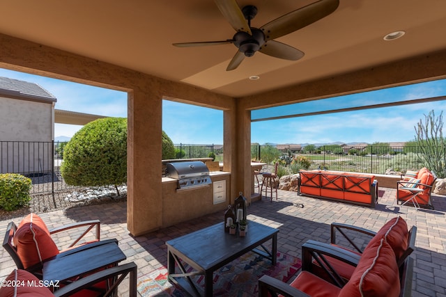 view of patio / terrace with outdoor lounge area, ceiling fan, and a grill