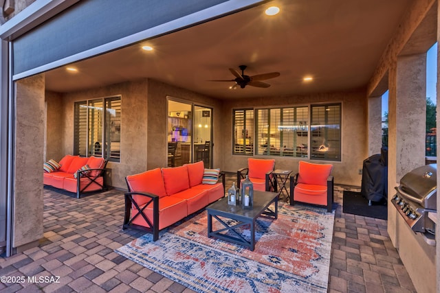 view of patio / terrace with outdoor lounge area, a grill, and ceiling fan