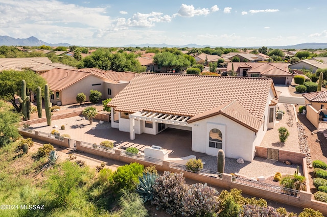 birds eye view of property with a residential view