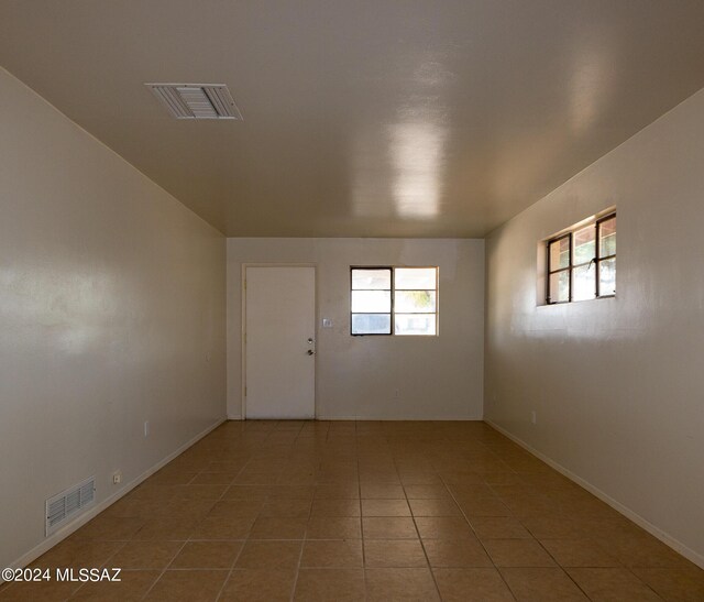 view of tiled empty room