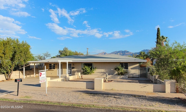 ranch-style house with a mountain view