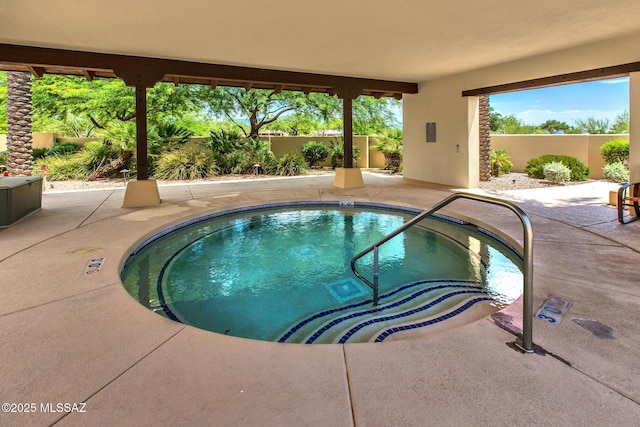 view of swimming pool featuring a patio area