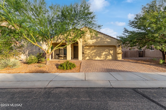 view of front of home featuring a garage