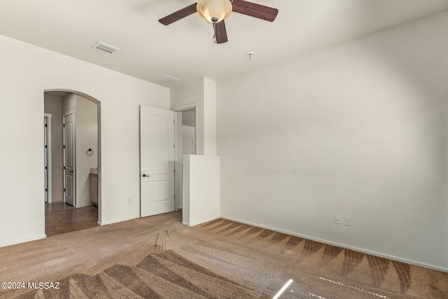 unfurnished bedroom with carpet floors and ceiling fan