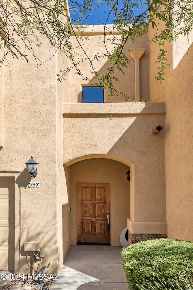 entrance to property featuring a garage