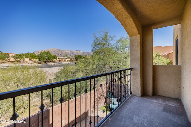 balcony featuring a mountain view