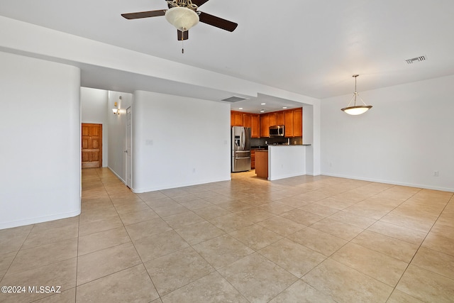 interior space featuring light tile patterned floors and ceiling fan