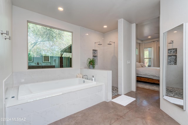 full bath featuring recessed lighting, a walk in shower, a garden tub, and ensuite bathroom