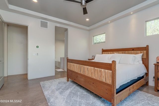 bedroom with recessed lighting, a raised ceiling, visible vents, a ceiling fan, and finished concrete floors