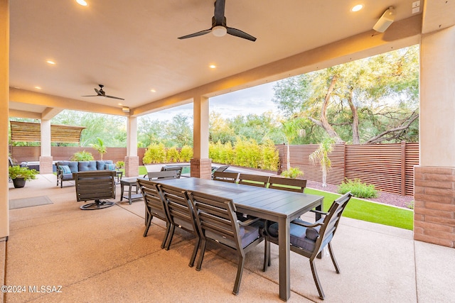 view of patio / terrace featuring ceiling fan