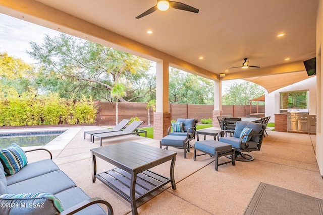 view of patio / terrace with ceiling fan, a fenced backyard, an outdoor living space, and a fenced in pool