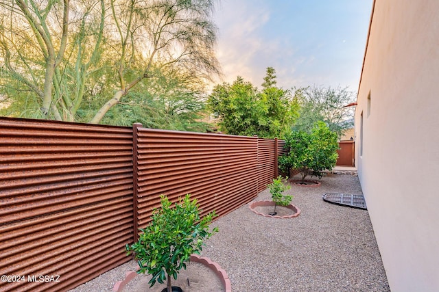 view of yard featuring a patio area and fence