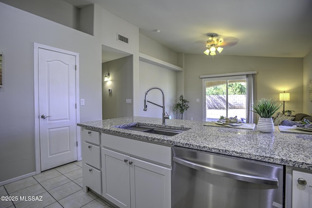 kitchen featuring white cabinetry, a ceiling fan, light stone countertops, dishwasher, and a sink