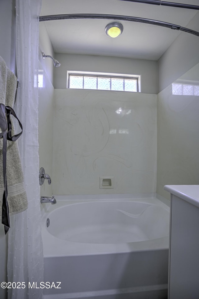 full bathroom with shower / bathtub combination with curtain and vanity