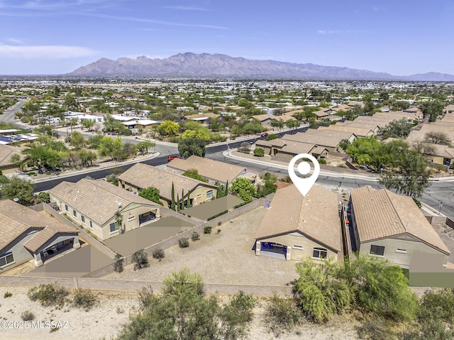 drone / aerial view featuring a mountain view and a residential view