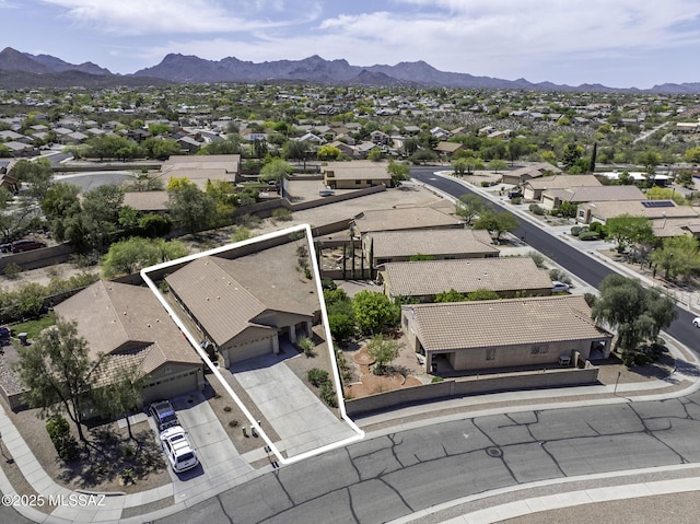 birds eye view of property with a residential view and a mountain view