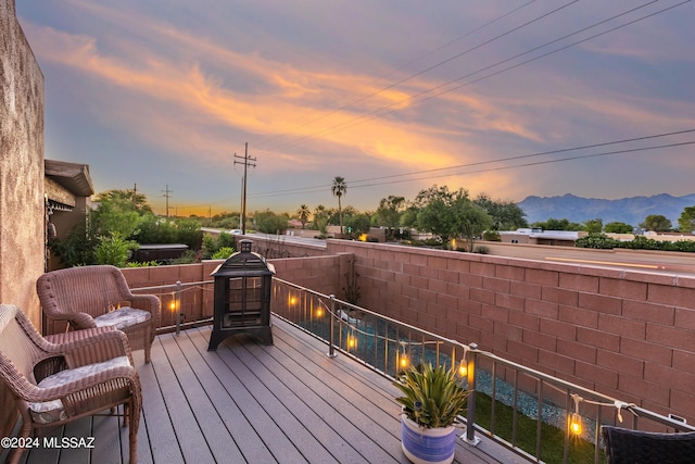 wooden terrace with a mountain view