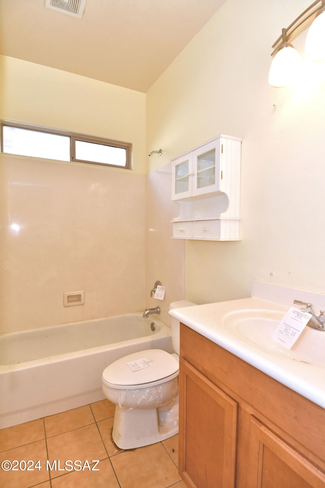 full bathroom with tile patterned flooring, shower / bathing tub combination, vanity, and toilet