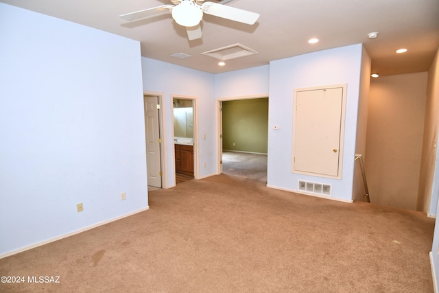 carpeted empty room with ceiling fan