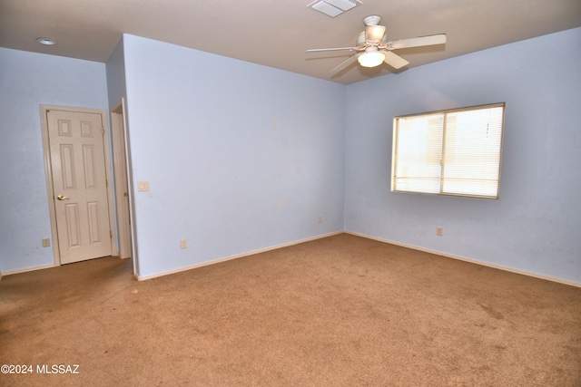 carpeted empty room with ceiling fan