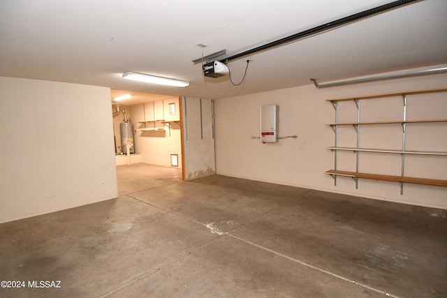 garage with a garage door opener and gas water heater