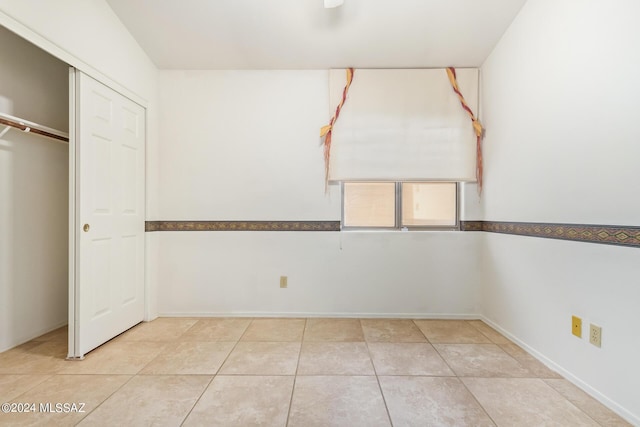 interior space featuring light tile patterned floors