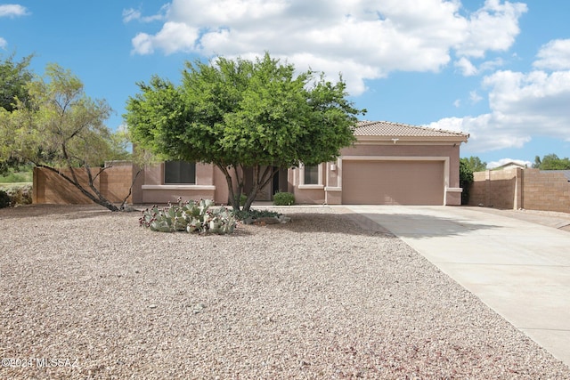 view of front of home featuring a garage