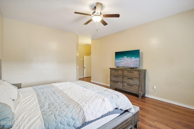 bedroom with hardwood / wood-style floors and ceiling fan