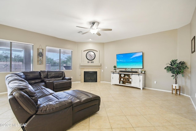 tiled living room with ceiling fan