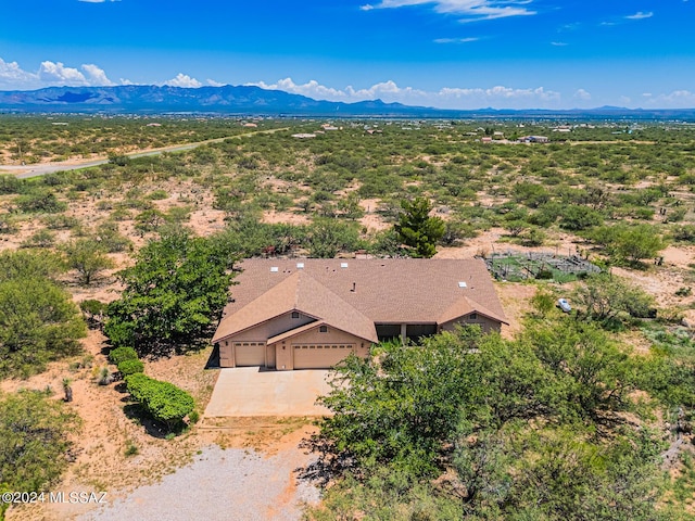 drone / aerial view featuring a mountain view