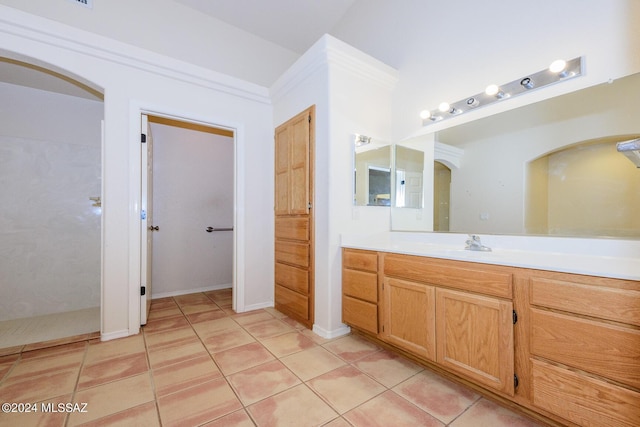 full bath with tile patterned flooring and vanity