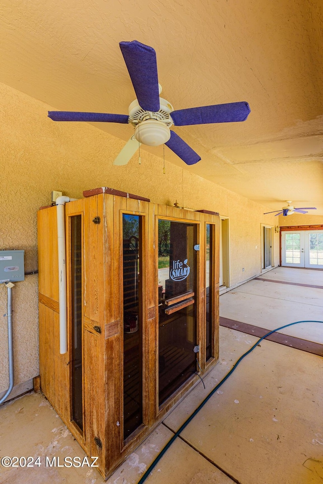 exterior space with a ceiling fan