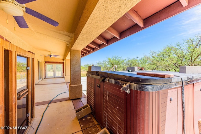 view of patio / terrace featuring ceiling fan and french doors