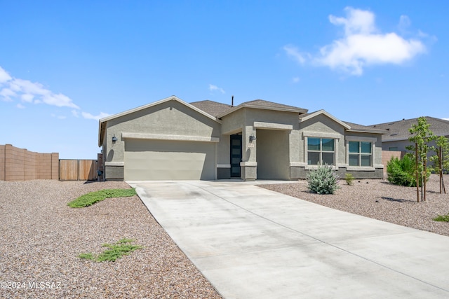 view of front of property featuring a garage