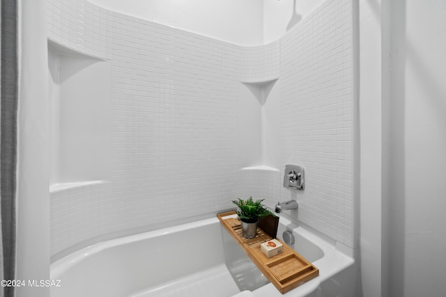 bathroom with shower / tub combination