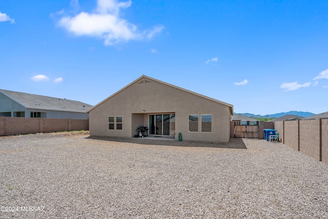 rear view of house featuring a patio area