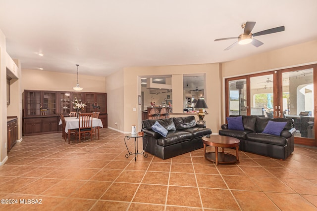 tiled living room featuring ceiling fan