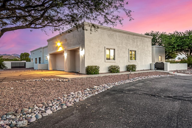 view of property exterior at dusk