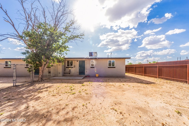 back of property featuring a patio