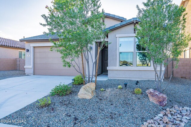 view of front of home with a garage